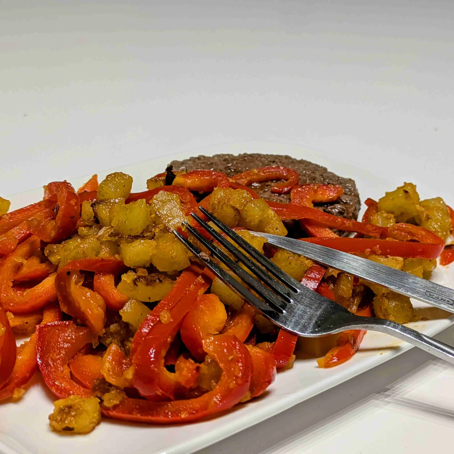 Poêlée de poivrons, oignons et pommes de terre